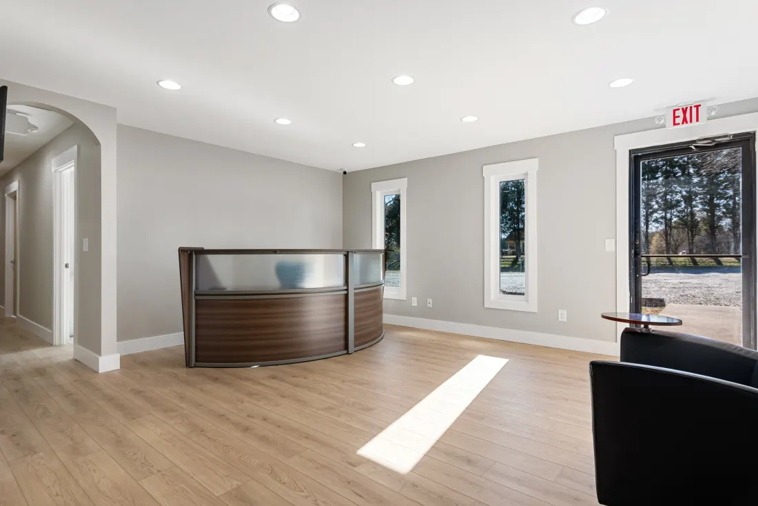 Multiple boats and jet skis stored inside Southern Storage indoor climate-controlled facility NC